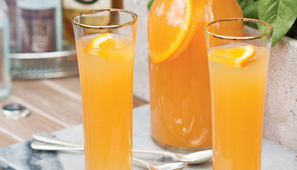 10 Cocktails to Make this Mardi Gras Season - Page 10  Spiced Rum Punch Recipe