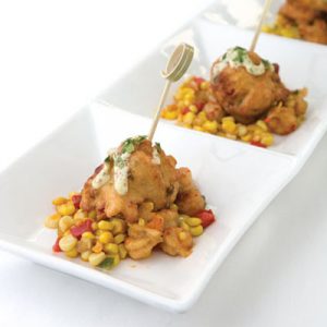 2012 Chefs to Watch - Zac Watters  Shrimp and Andouille Beignets with Crawfish Corn Maque Choux
