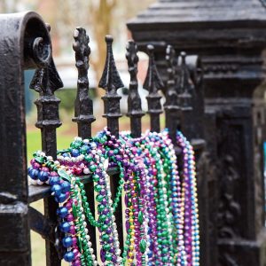 Fence with Mardi Gras Beads