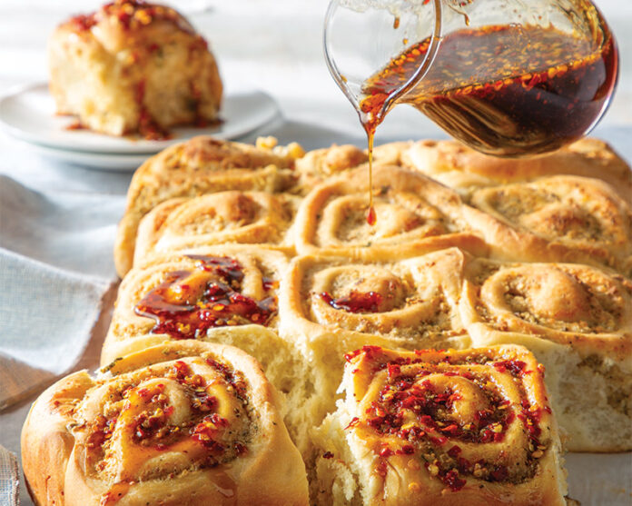Bring a little savory to a sweet favorite when you whip up a batch of Boudin Rolls with Spicy Cane Syrup.