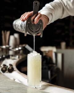 A Short Season to Savor: Chandelier Bar’s “Be Our Guest, Mr. Collins” Cocktail - Louisiana Cookin' Celebrate the beauty of a New Orleans spring with the refreshing Be Our Guest, Mr. Collins cocktail made for slow sipping from Craig Seaman at Chandelier Bar 