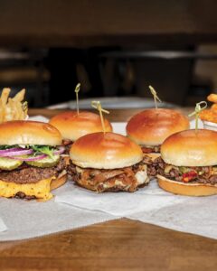 New + Interesting March/April 2026 - Louisiana Cookin' By Kaitlyn Shehee Wagyulicious BATON ROUGE | wagyulicious.com Baton Rouge’s newest restaurant, Wagyulicious, is making wagyu-style beef—with its buttery marbling, tender texture, and rich flavor—approachable and affordable, setting the restaurant apart from your standard run-of-the-mill burger joint. A cut above the rest, this establishment offers showstopping burgers and other bites (think loaded fries, boudin egg 