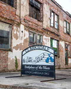 Weekend Away: Clarksdale, Mississippi - Louisiana Cookin' Set your sights on the Mississippi Delta for a soulful few days. Weathered brick building with peeling plaster and a CLARKSDALE sign: Birthplace of the Blues, with musical notes and blue guitars on display.