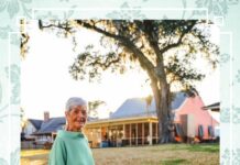 Brunch à la Bienvenu: Classic Louisiana Brunch Recipes from Marcelle Bienvenu Older woman with short gray hair stands on a leaf-covered lawn in a mint green blouse and white pants, with houses and a large tree in the background.