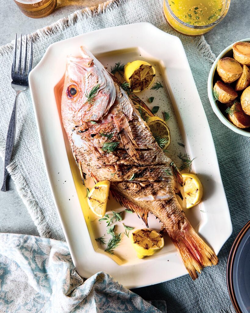 Grilled Whole Redfish with Butter-Herb Sauce